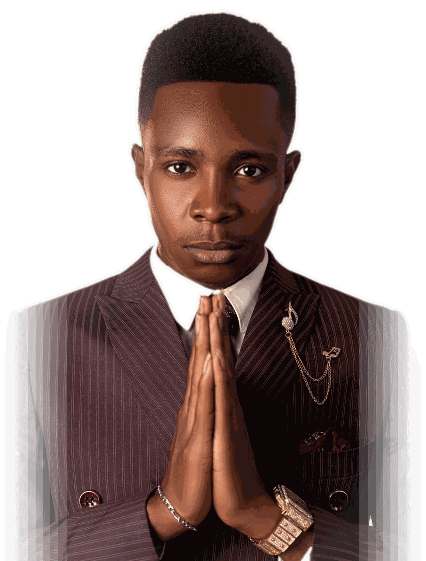 NWELL, hands clasped in prayer, wearing a maroon pinstripe suit.