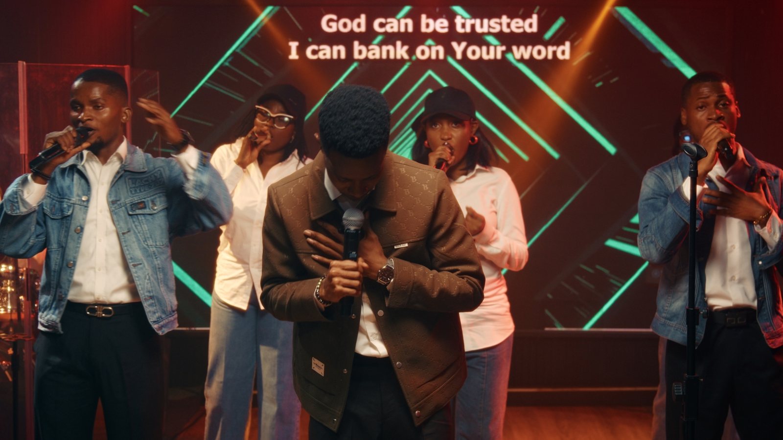 NWELL centre stage as the lyric wall reads: God can be trusted, I can bank on Your word.